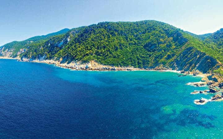 Rich green scenery and the beach in Skopelos