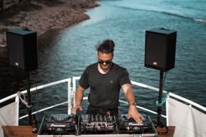 a DJ in a boat party