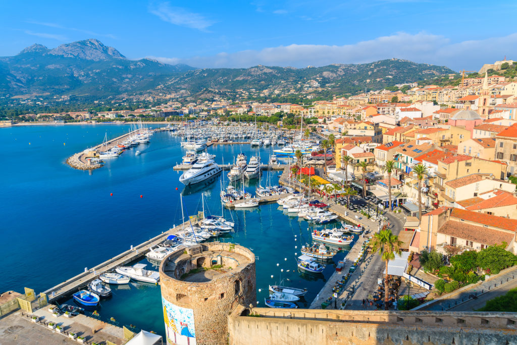 Aerial view of the port of Calvi and the surrounding old town and hills