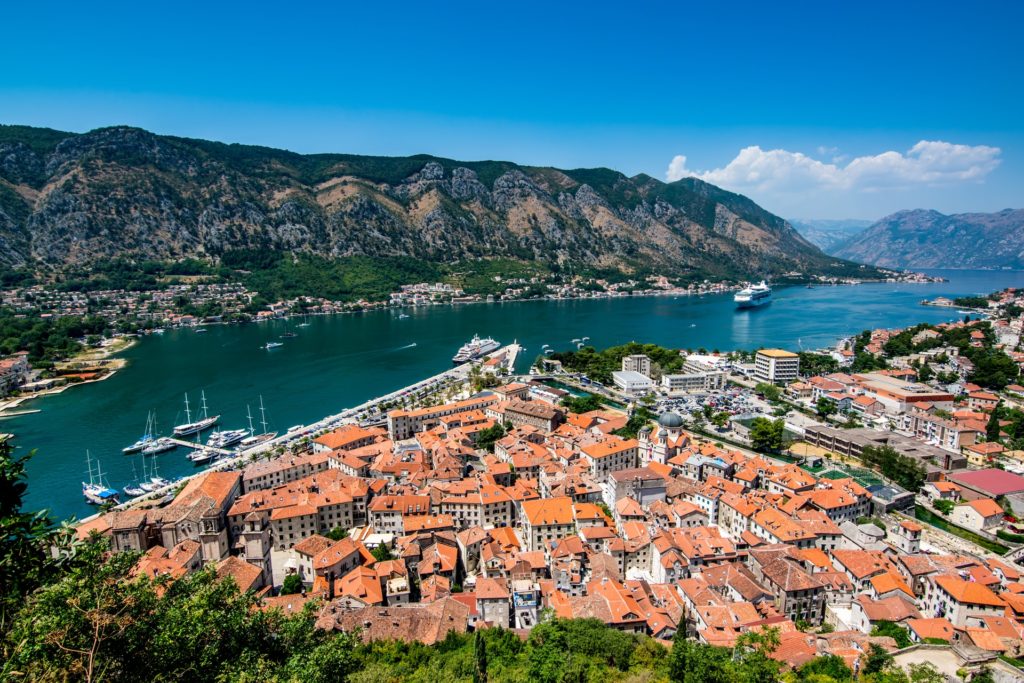 Aerial view of the port in Kotor, Montenegro with the surrounding hills and buildings