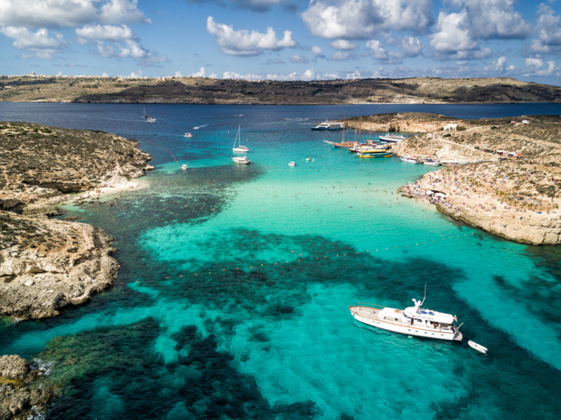 Boats in The Blue Lagoon in Comino, Malta