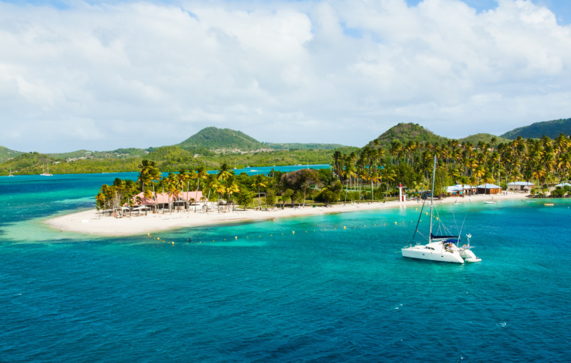 Catamaran in the Grenadine islands, book with SamBoat